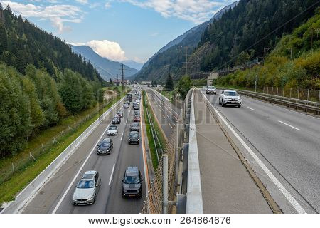 Vehicles Waiting In Line For Entering Gotthard Tunnel On Switzerland