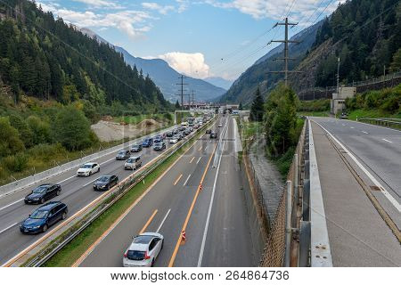 Vehicles Waiting In Line For Entering Gotthard Tunnel On Switzerland