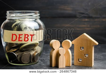 Glass Jar With Coins And The Inscription 