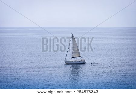 Sailboat Near The Sea Shore Of Acitrezza, Catania, Sicily, Italy