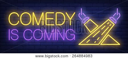 Comedy Is Coming Neon Sign. Searchlights On Brick Background. Standup Show, Live Show, Performance. 
