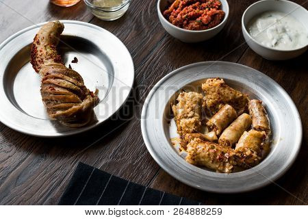 Turkish Food Minced Meat And Rice Stuffed Tripe Mumbar Dolma With Sirdan / Shirdan Dolmasi.