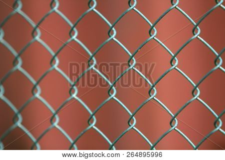 Close-up Of Isolated Painted Simple Geometric Black Iron Metal Wire Chain Link Fence Eon Dark Red Ba