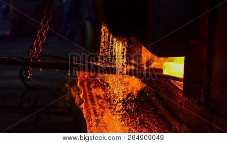 Melting Of Metal In A Steel Plant. High Temperature In The Melting Furnace. Metallurgical Industry.