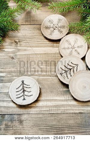 Christmas Homemade Pyrography Toys. Wooden Slice. Alternative Decor. Christmas Decorations. Close Up