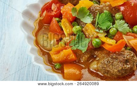 Filipino Beef Kaldereta, Dish Is Cooked In A Tomato-based Sauce With Vegetables