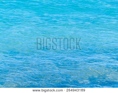 Nature Background Of Transparent, Turquoise Water Of Tyrrenian Sea. Copy Space.