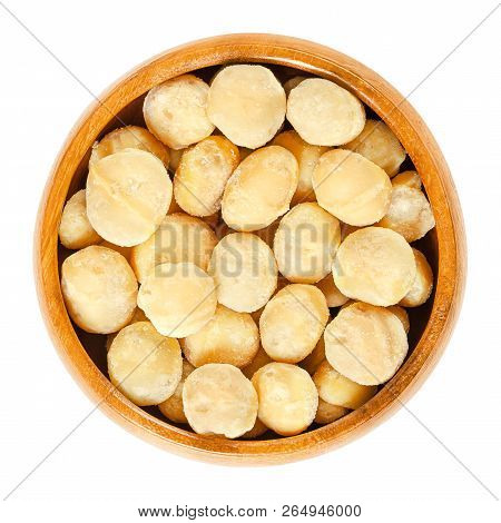 Roasted And Salted Macadamia Nuts In Wooden Bowl. Also Called Queensland, Bush, Maroochi, Bauple Or 