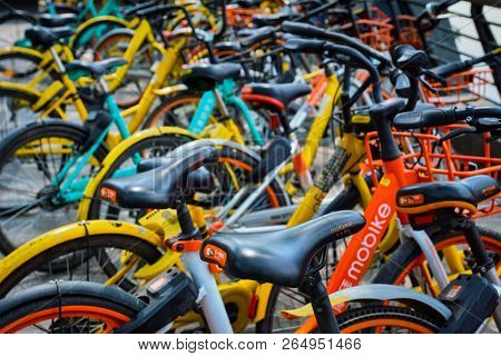 CHENGDU, CHINA - APRIL 15, 2018: Mobike bikes for share parked in Chengdu, Sichuan, China