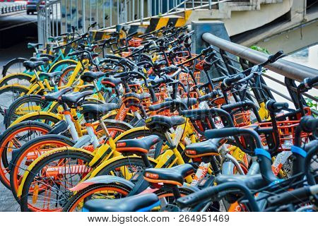 CHENGDU, CHINA - APRIL 15, 2018: Mobike bikes for share parked in Chengdu, Sichuan, China