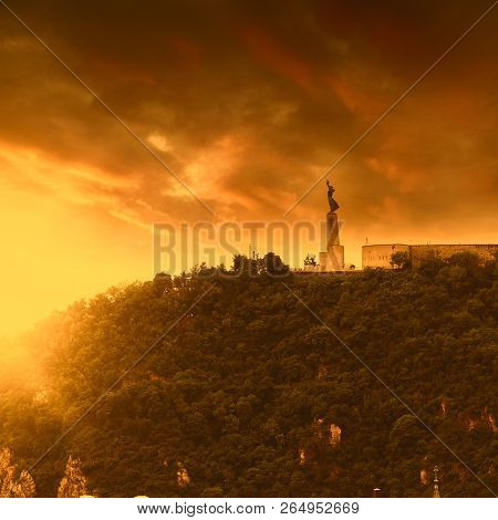 Statue Of Liberty, Gellert Hill, Budapest, Hungary. Panorama Of The City With A Statue On The Horizo