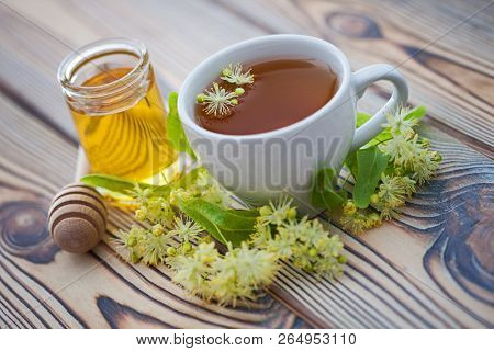 cup of linden tea and linden honey - healthy lifestyle