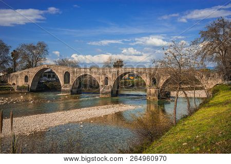 Medieval Bridge Over River Arahthos In Arta, Greece