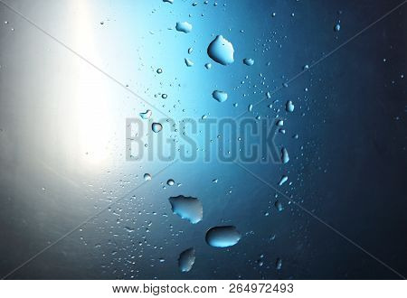 Abstract Water Drop Blue Light Spot Background Close Up