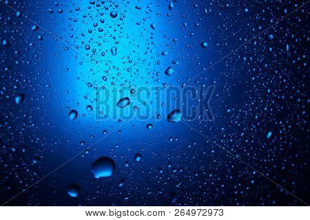 Abstract Water Drop Blue Light Spot Background Close Up