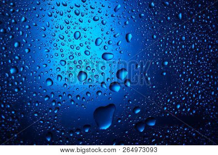 Abstract Water Drop Blue Light Spot Background Close Up