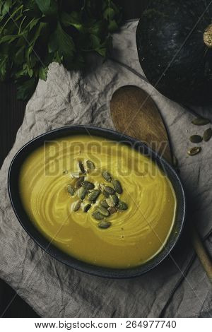 Winter Vegetarian Creamy Seasonal Soup In Bowl Over Rustick Background, Flat Lay Top View, Healthy F