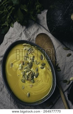 Winter Vegetarian Creamy Seasonal Soup In Bowl Over Rustick Background, Flat Lay Top View, Healthy F