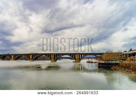 Francis Scott Key Bridge Across Potomac River, Winter Fog On The Water.