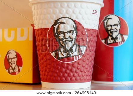 Moscow, Russia, October 11, 2018 : Coffee in paper cups with KFC logo on the table at KFC