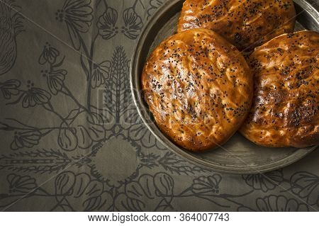 Turkish Pastry, Scone Or Bun With Walnut On Traditional Tokat Table Cloth, Homemade Pastry Concept