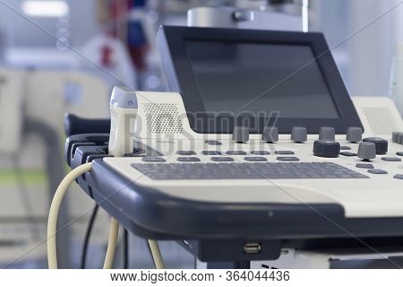 Close Up Ultrasound Transducer On Ultrasound Machine In Intensive Care Unit  In Hospital.