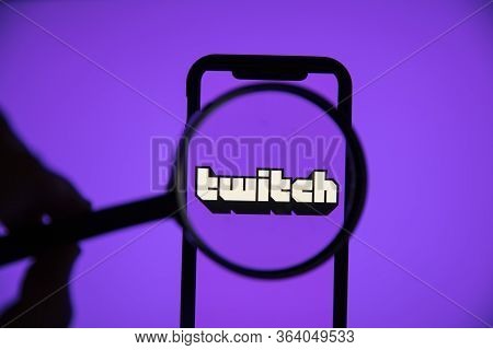London, Uk - April 30 2020: Twitch Live Gaming Logo Under A Magnifying Glass