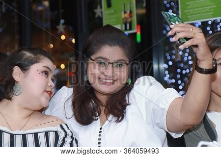 Bangkok,thailand,21 Dec 2019,
Office Employees Celebrate The New Year Party By Wearing A Sports Dres