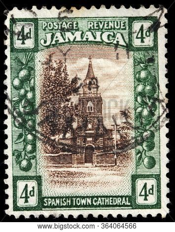 Luga, Russia - April 10, 2020: A Stamp Printed By Jamaica Shows View Of The St. Jago De La Vega Cath
