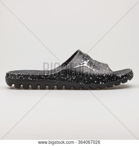 Vienna, Austria - February 19, 2018: Nike Jordan Super Fly Team Slide Black And White Sandal On Whit