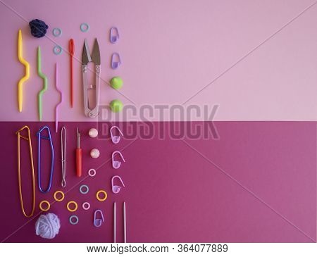 Top View Or Flat Lay Of Colorful Must-have Plastic And Aluminum Knitting And Crochet Tools Or Access