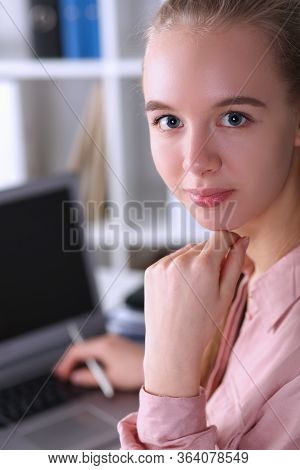 Girl Sitting Near Laptop At Home During Quarantine. Successful Online Student Training. Learning New