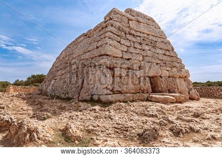 View Of La Naveta Des Tudons - The Most Famous Of Menorca’s Megalithic Sites.