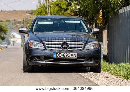 Dirty Mercedes Car Parked Along The Street In Razvad, Romania, 2020