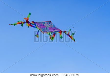 Children's Toy. Children Fly A Flying Kite.
Background Image For Web Design.