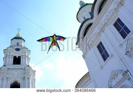 Children\'s Toy. Children Fly A Flying Kite.\nbackground Image For Web Design.
