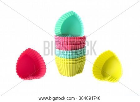 Multi-colored Silicone Cake Baking Dishes Isolated On A White Background. Silicone Baking Dishes In 