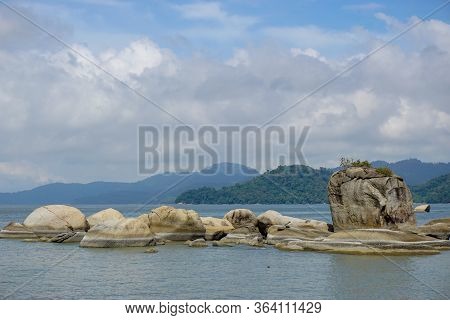 Rock Formation On The Beach In Permatang Damar Laut, Penang.