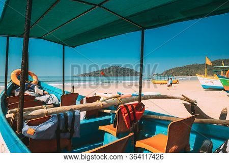 Canacona, Goa, India - February 16, 2020: Sightseeing Tourist Boat Parked On Famous Palolem Beach In