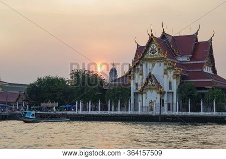 Bangkok, Thailand - July 24, 2010:  Wat Rakhangkhositraram Woramahavihan Temple Near Chaopraya River