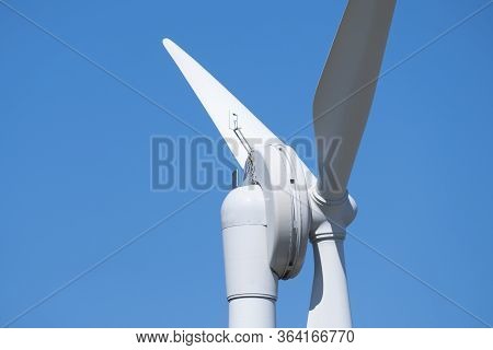 A Part Of A White Metal Windmill, On A Beautiful Clear Day Netherlands Groningen, The Netherlands