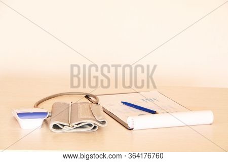 Close-up - Doctor Measures Blood Pressure