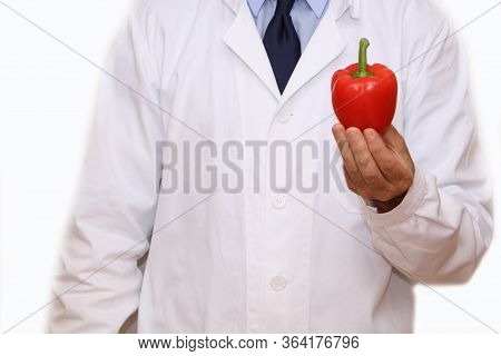 The Doctor Is Holding Vegetables And Fruits For Proper Wholesome Nutrition