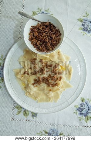 Roasted Meat In A Bowl . A Bowl Of White Ceramic Salt And Pepper . Traditional Azerbaijani Khingal W