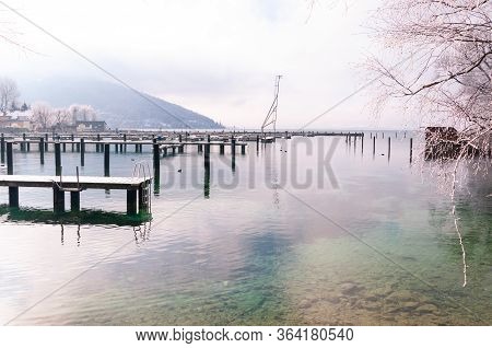 Jetty On Lake Attersee On A Snowy Winter Day