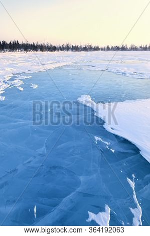 Frozen Lake With Boreal Forest (taiga) And Tundra In Background At Wapusk National Park, Canada, Dur