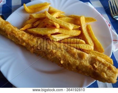 Classical Traditional Fish And Chips Served In A Restaurant In England Uk