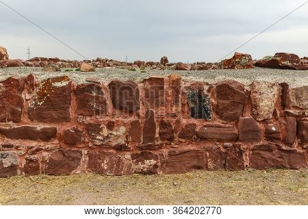 Akyrtas Palace Complex. Kazakhstan. Red Sandstone Wall.