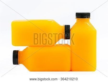 Orange Juice In A Cube-shaped Plastic
