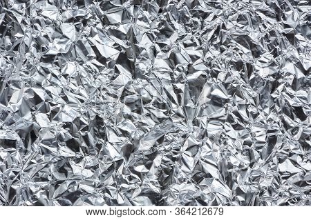 Crumpled Metal Foil Texture Macro As Background